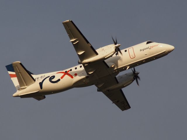 Saab 340 (VH-OLL) - Lifting off on a dull, grey afternoon from runway 23, Adelaide International Airport. Photo taken from the Tapleys Hill Road viewing area.