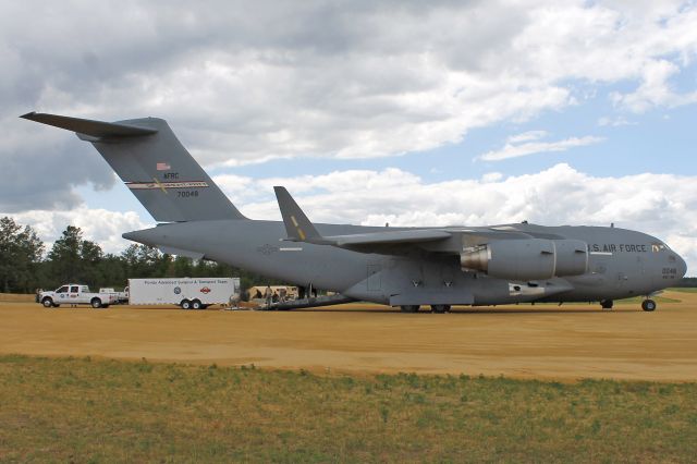 Boeing Globemaster III (97-0048) - Florida Advanced Surgical Transport Team (FAST) and equipment from Miami, Florida, being offloaded from a USAF C-17 Globemaster III, 97-0048, from the 445th Airlift Wing, Wright-Patterson AFB, OH, on 26 Jul 2013. Ft. McCoy and nearby Young Air Assault Strip was host to a joint-services field training and mass casualty exercise-Warrior Exercise 86-13-01 (WAREX).