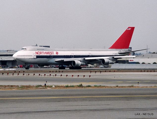 Boeing 747-200 (N615US) - KLAX - N615US in position and hold on runway 25R at Los Angeles. date apprx March 1990.