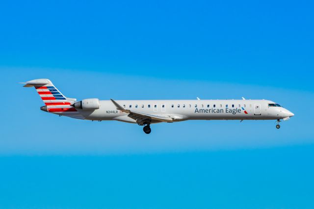 Canadair Regional Jet CRJ-900 (N244LR) - Mesa Airlines CRJ900 landing at DFW on 12/27/22. Taken with a Canon R7 and Tamron 70-200 G2 lens.