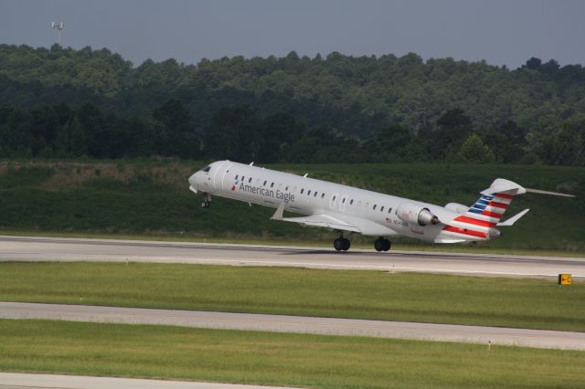 Canadair Regional Jet CRJ-900 (N548NN) - N548NN rotating runway 23R