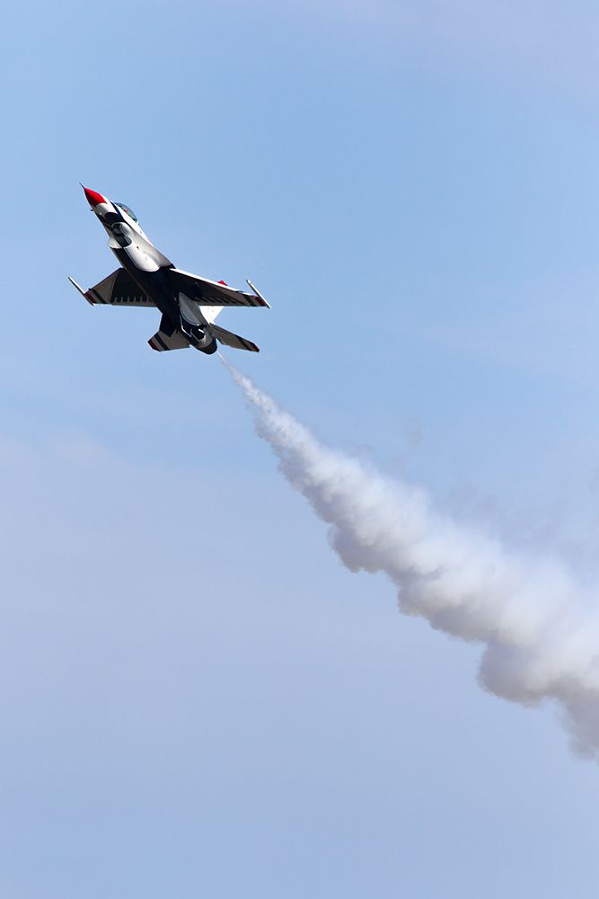 Lockheed F-16 Fighting Falcon — - Super slow pass. So cool how they do this. They aren't going fast enough for the wings to generate lift, so thrust alone is keeping the aircraft airborne. What a cool maneuver! Must take some real courage to learn. Questions about this photo can be sent to Info@FlewShots.com