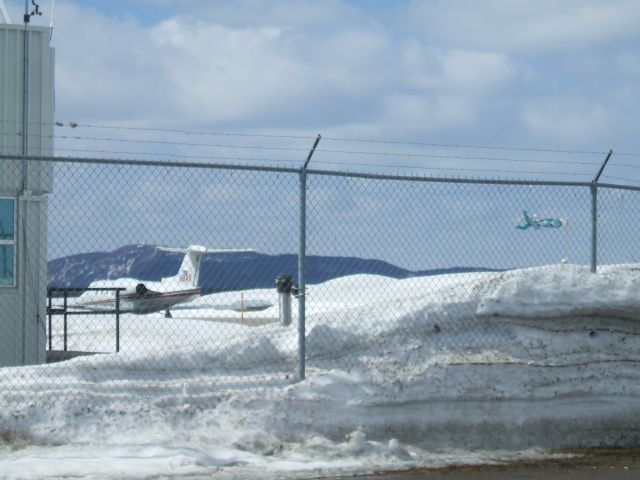 Learjet 35 (N18AX) - Parked at Irving Aviation FBO,Goose Airport NL. April 26/09