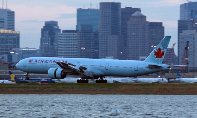 BOEING 777-300ER (C-FNNU) - Air Canada B777-300 arrival to Boston on 5/15/20 at dusk doing a COVID19 flight.