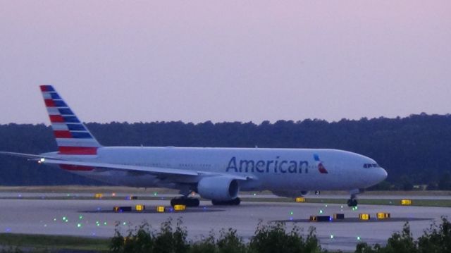 Boeing 777-200 (N755AN) - American 174 departing to London LHR at 8:42 P.M.  Taken June 7, 2015.  