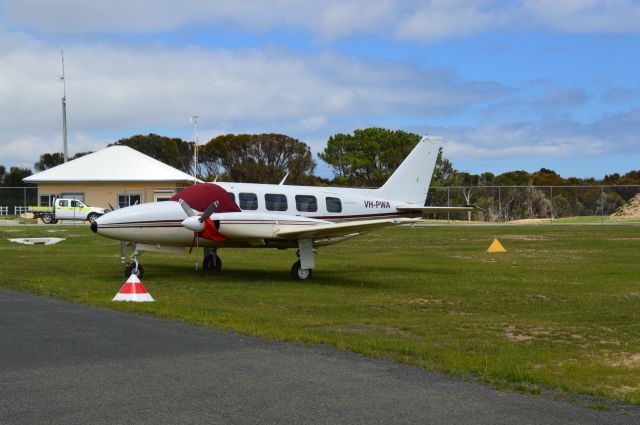 Piper Navajo (VH-PWA) - VH-PWA at FLINDERS island, Feb 2016