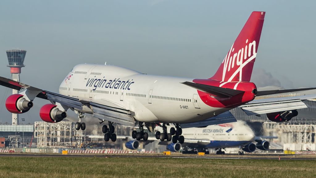 Boeing 747-400 (G-VHOT) - Landing on runway 027L at LHR.