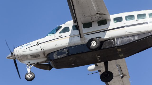 — — - On short finals to runway 01.