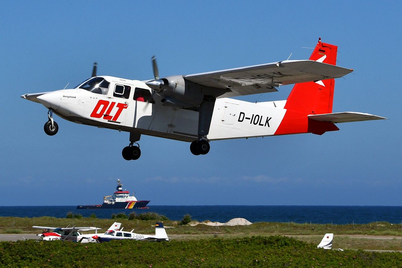 ROMAERO Islander (D-IOLK) - Take-off between the dunes. 06-13-21.br /Britten-Norman BN2B-20 Islander.br /The German airline OLT makes several daily flights from the mainland to the dune of Helgoland.br /This small airport is built on sand and you have always a lot of seagulls sitting on the runways.