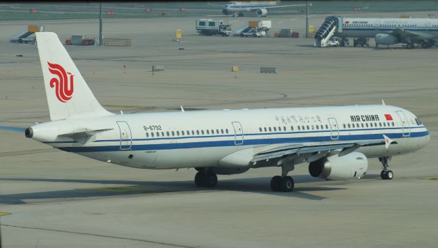 Airbus A321 (B-6792) - 062318 Air China on push-back from Terminal 3-C