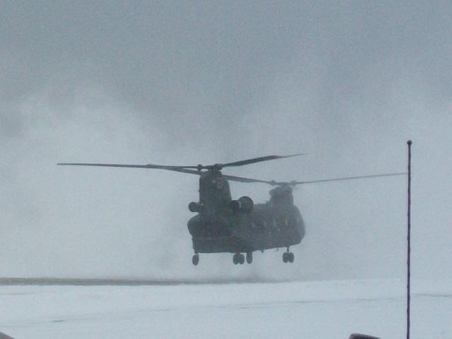 — — - Army Reserve CH-46 from Akron/Canton, Ohio clearing the snow from the runway at the Holmes County Airport in Millersburg, OH, the heart of Amish Country. He was doing training maneuvers at our airport so I decided to ask him if hed be willing to "Blow" the snow off our runway, he said "Not a problem sir!" and he proceeded to do a VERY SLOW pass down our 3500 foot runway. He took about 30 minutes and cleared it to dry pavement!