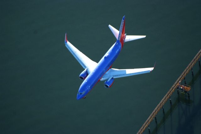 — — - I was in a C-172 talking to NORCAL when I took this with my 300mm lens as the Southwest Jet was on final and passed beneath us.