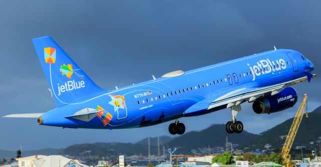 Airbus A320 (N779JB) - JetBlue N779JB Airbus A320 Bluericua departing TNCM St Maarten for KJFK New York on a rainy afternoon.br /16/11/2018