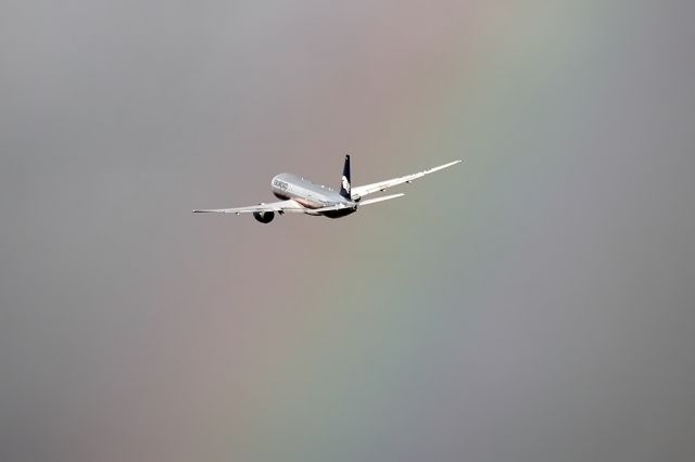 Boeing 777-200 (N746AM) - Rainbow behind of 777!!!!