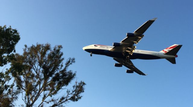 Boeing 747-400 — - Taken from Balboa Park where landing planes fly over low, with an iPhone