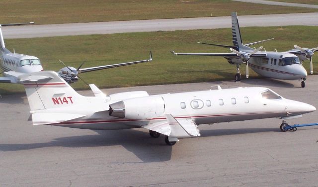 Learjet 31 (N14T) - I just love old Lear Jets N14T LJ31 being just one of them ...Seen here at Fulton County Atlanta (KFTY) during the NBAA week ...Photo by Mike Day