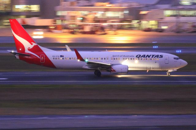 VH-VYA — - VH-VYA Departing 16R after dark.. Taken from the International carpark with a 70-200mm