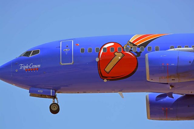 Boeing 737-700 (N409WN) - Southwest Boeing 737-7H4 N409WN Triple Crown at Phoenix Sky Harbor on July 28, 2018. 