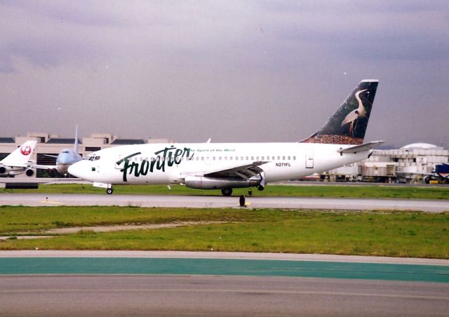 Boeing 737-200 (N271FL) - B737 landing at KLAX - photo from the old Imperial Terminal parking lot.