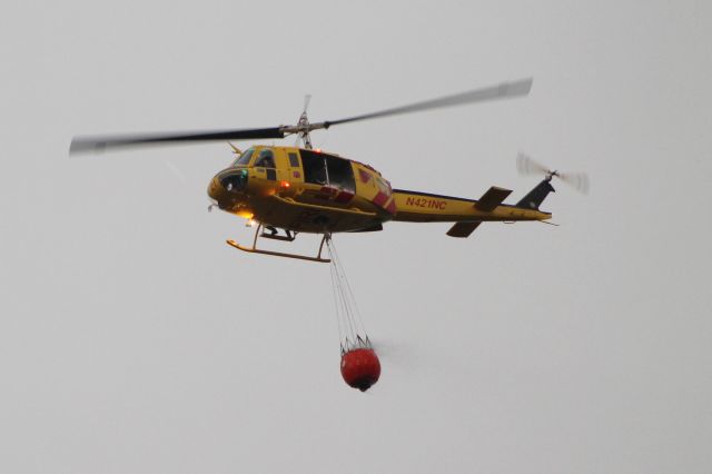 N421NC — - NC Forest Service    Full basket, dropping on forest fire in the South Mountain State Park area, western North Carolina.