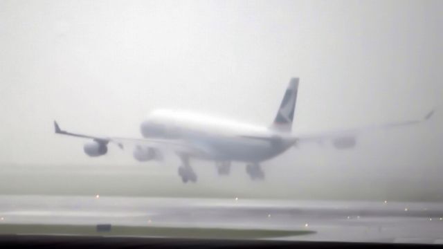 Airbus A340-300 — - Photo Taken on heavy rain