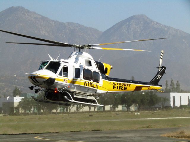 Bell 412 (N110LA) - Landing at Brackett Field