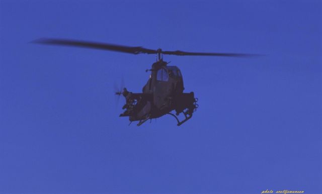 — — - AH-1C climbout heading zero eight OCT88