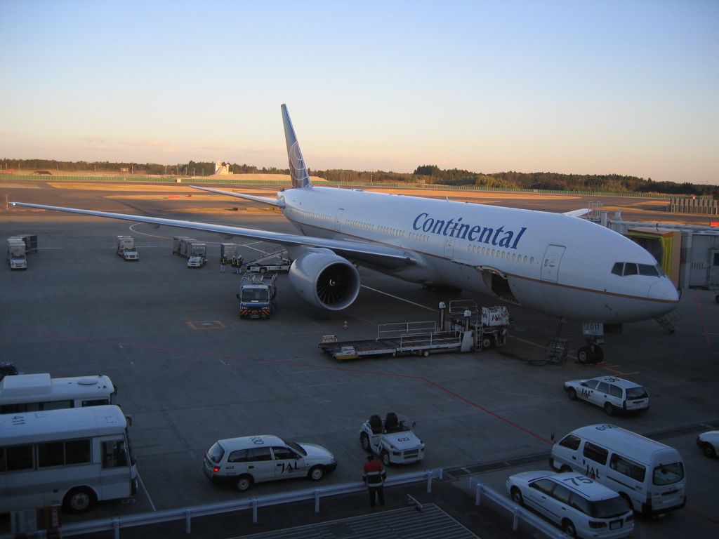 Boeing 777-200 (N79011) - Parked at the gate prior to flying back home.