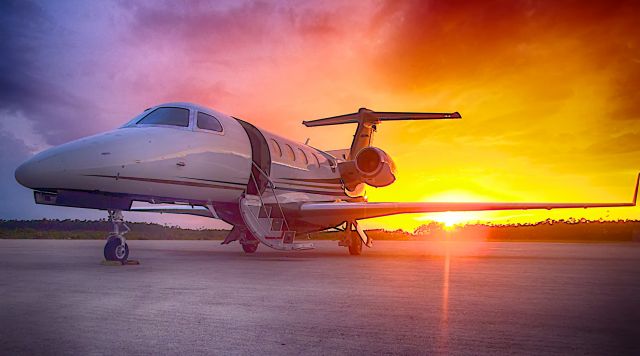 Embraer Phenom 300 (N322FL) - Just landed - beautiful sunset!