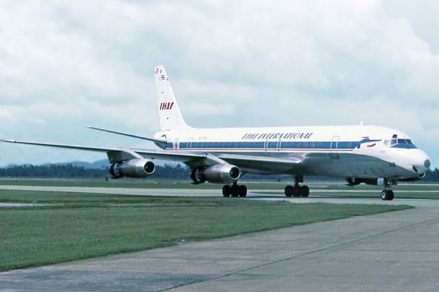 HS-TGS — - Douglas DC-8-30 HS-TGS Thai International_ WMKB mid 1970s.