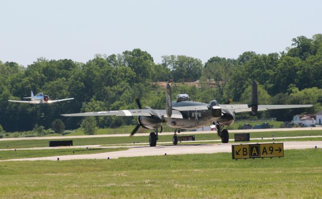 North American TB-25 Mitchell (N345TH) - Two of North Americans most famous aircraft together in one photo!