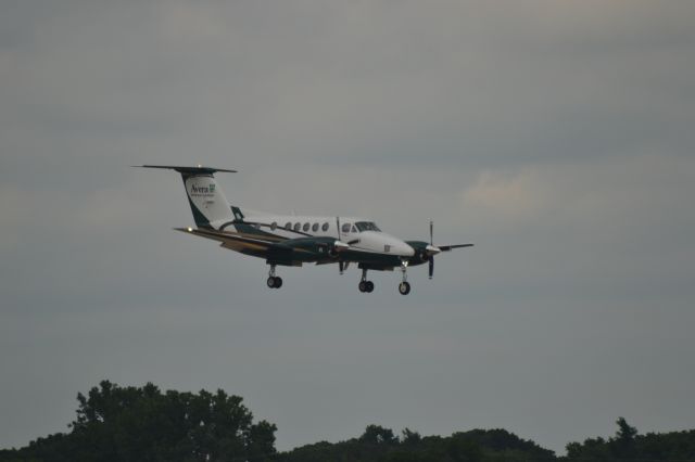 Beechcraft Super King Air 200 (N911MN) - Avera N911MN arriving on Runway 15 in Sioux Falls SD while conducting a MEDVAC flight on 6-12-15