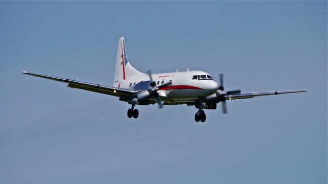 CONVAIR CV-580 (N580HW) - Honeywells Convair 340-31 (Ser#2) on final approach to runway 16R on 5/7/14.