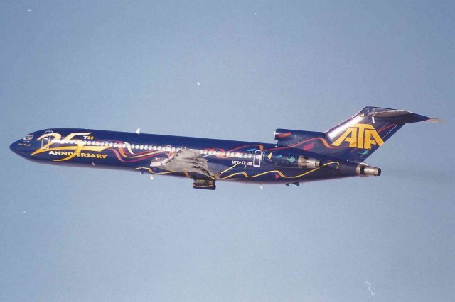 BOEING 727-200 (N772AT) - Blasting off of 23-L on a very cold winters morning. Scanned from a print.