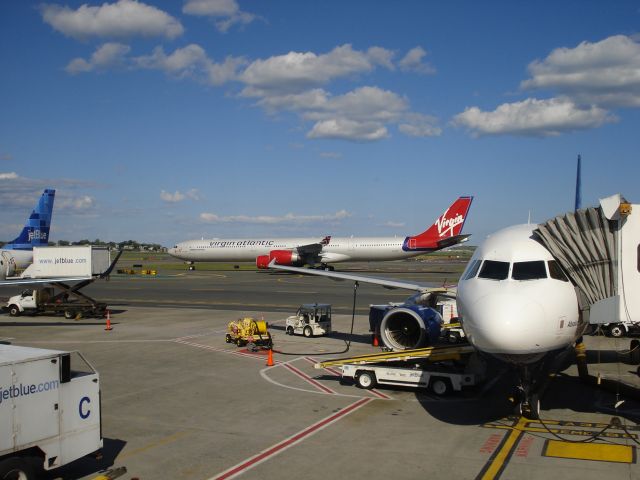 — — - JULY 3RD IN BOSTON (09) TAKEN FROM TERMINAL C OF THE JETBLUE SIDE