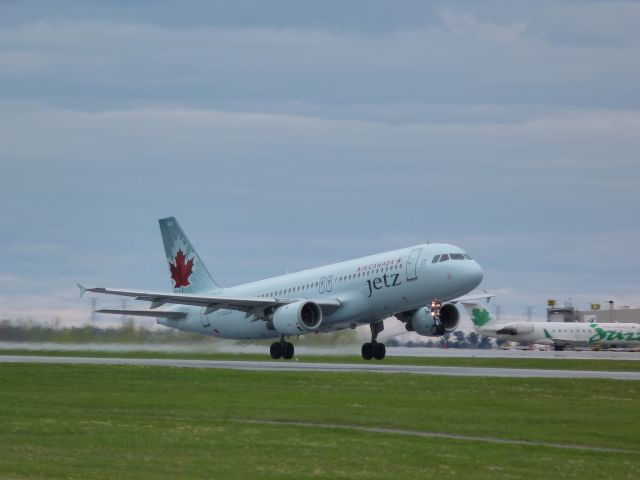 Airbus A321 (C-GQCA) - Jetz charter service from Air Canada