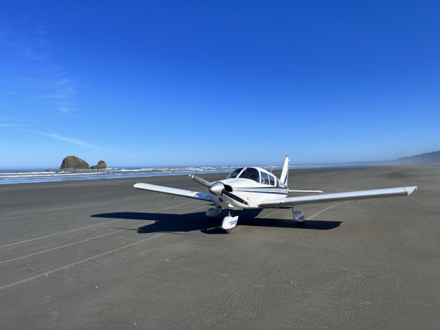 Piper Cherokee (N9551J) - N9551J after landing next to the Pacific Ocean at Copalis State Airport. 