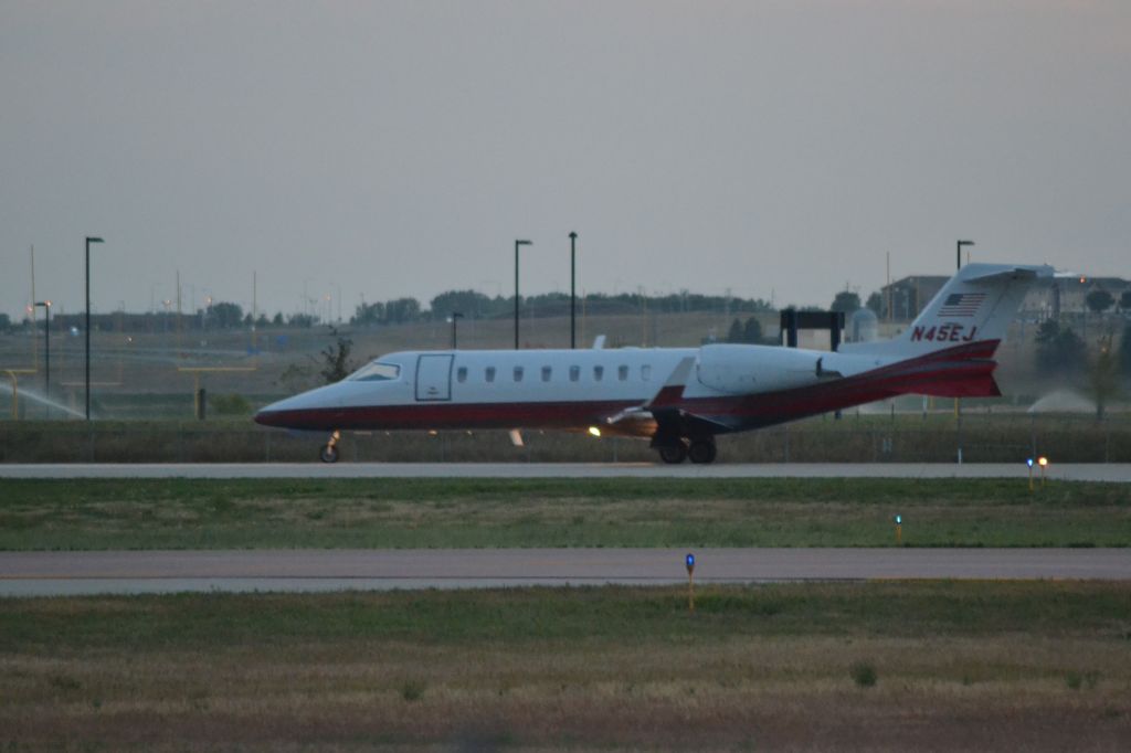 Learjet 45 (N45EJ) - N45EJ departing Sioux Falls