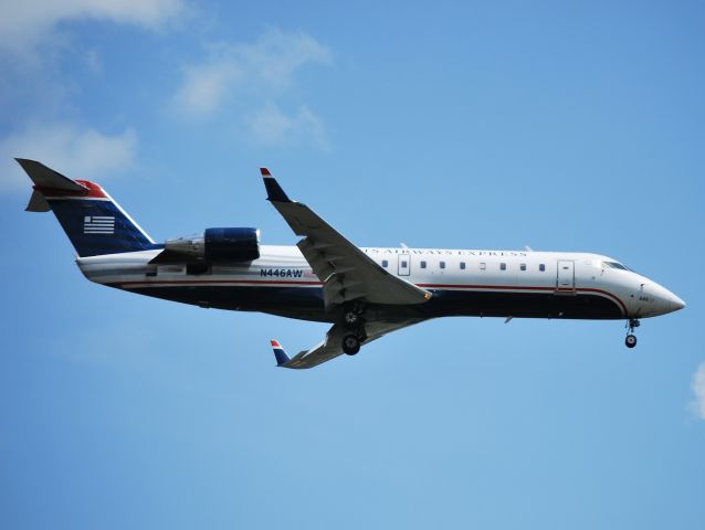 Canadair Regional Jet CRJ-200 (N446AW) - Final for runway 23 - 3/25/13