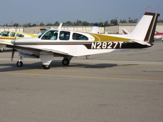 Beechcraft Bonanza (33) (N2827T) - Taxiing at Fullerton