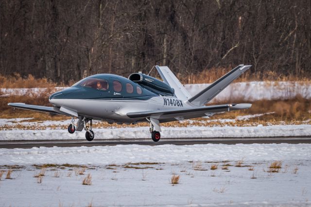 Cirrus Vision SF50 (N1408X) - Cirrus SF50, N1408X taking off from KLOM during a late winters day.