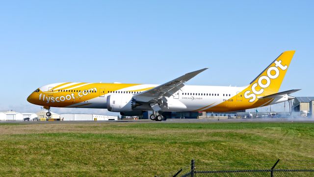 Boeing 787-9 Dreamliner (9V-OJB) - BOE128 landing on Rwy 34L to complete its B1 flight on 2/21/15. (ln 272 / cn 37113). This is the second Dreamliner for Scoot. The aircraft is named "Barry".