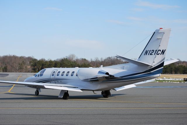 Cessna Citation II (N121CN) - CHET MORRISON SERVICES LLC taxiing to runway 20 at Concord Regional Airport - 3/4/09