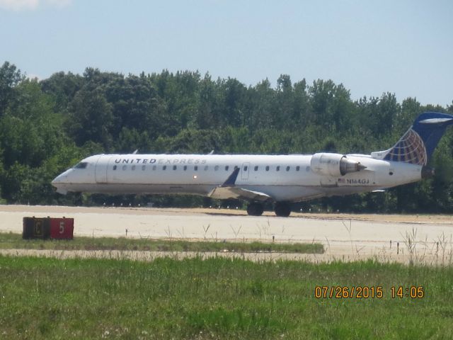 Canadair Regional Jet CRJ-700 (N164GJ) - Taken: Public Viewing area @ KORFbr /Camera: Canon PowerShot ELPH 110 HS