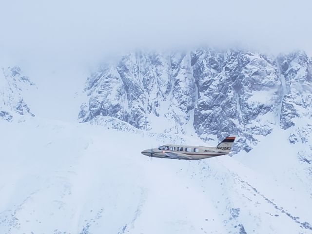 Piper Navajo (N45052) - Anchorage Aero Navajo N45052 cruises North along the Chugach mountains.