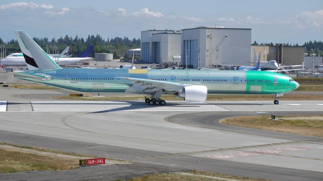 BOEING 777-300 (A6-EGZ) - BOE204 taxis onto runway 16R for a fast taxi test prior to its maiden flight on 8/31/12. (LN:104x  c/n 41081).