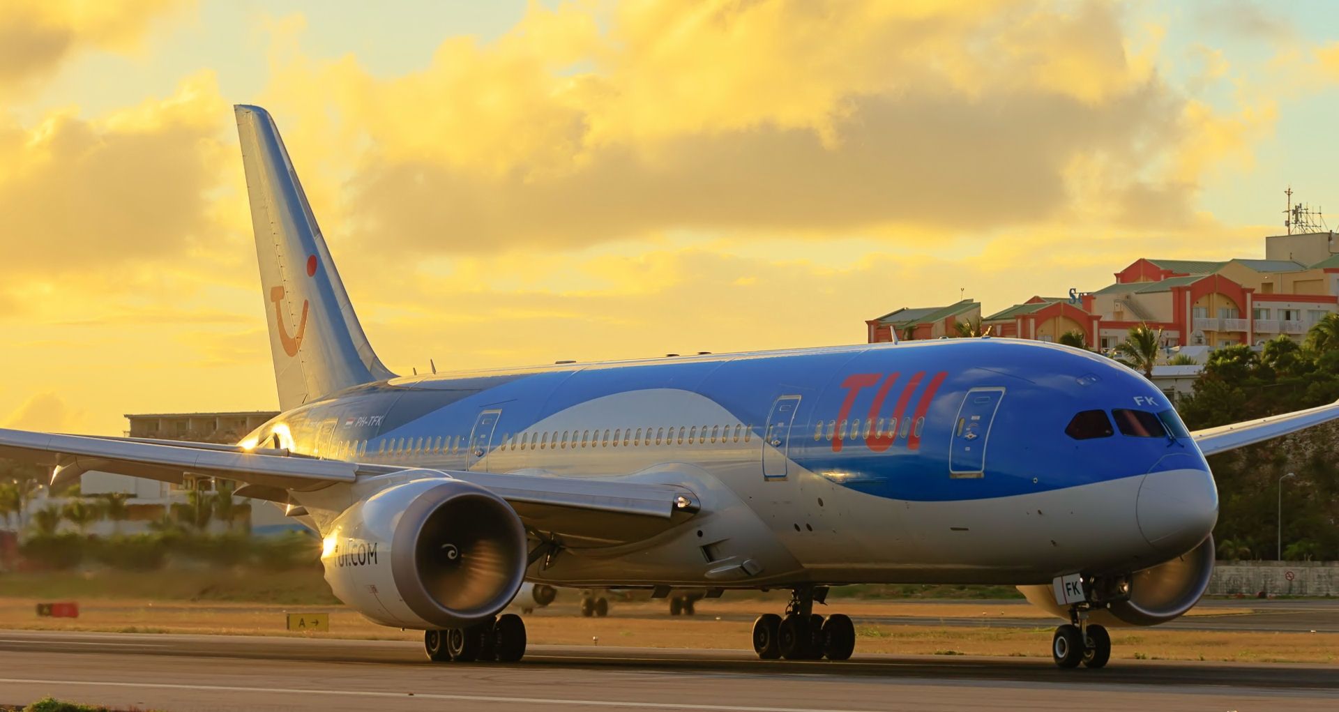 Boeing 787-8 (PH-TFK) - TUI departing TNCM at sunset