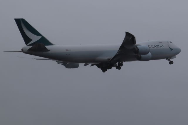 BOEING 747-8 (B-LJD) - Takeoff into fog, East side of Runway 15-33.