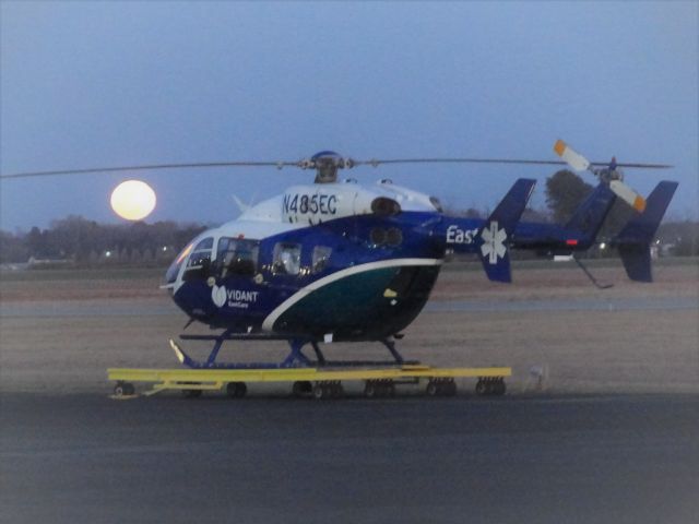 KAWASAKI EC-145 (N485EC) - Moonrising on horizon. Taken at Mount Olive Airport NC.