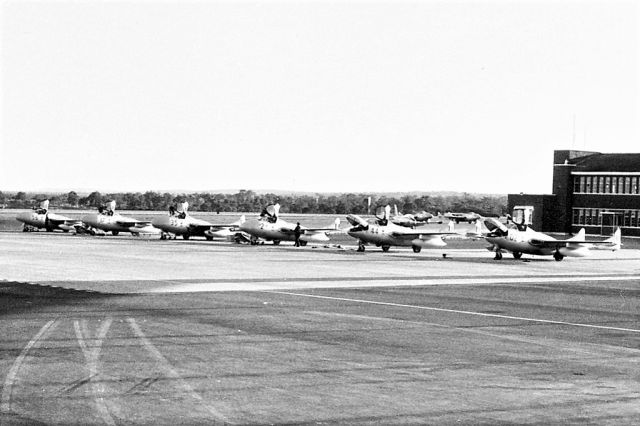 F+W EMMEN Vampire (A79644) - De Havilland Vampires TMK35s departing, replaced by Macchi MB-326H. RAAF Pearce (YPEA)late 1960.